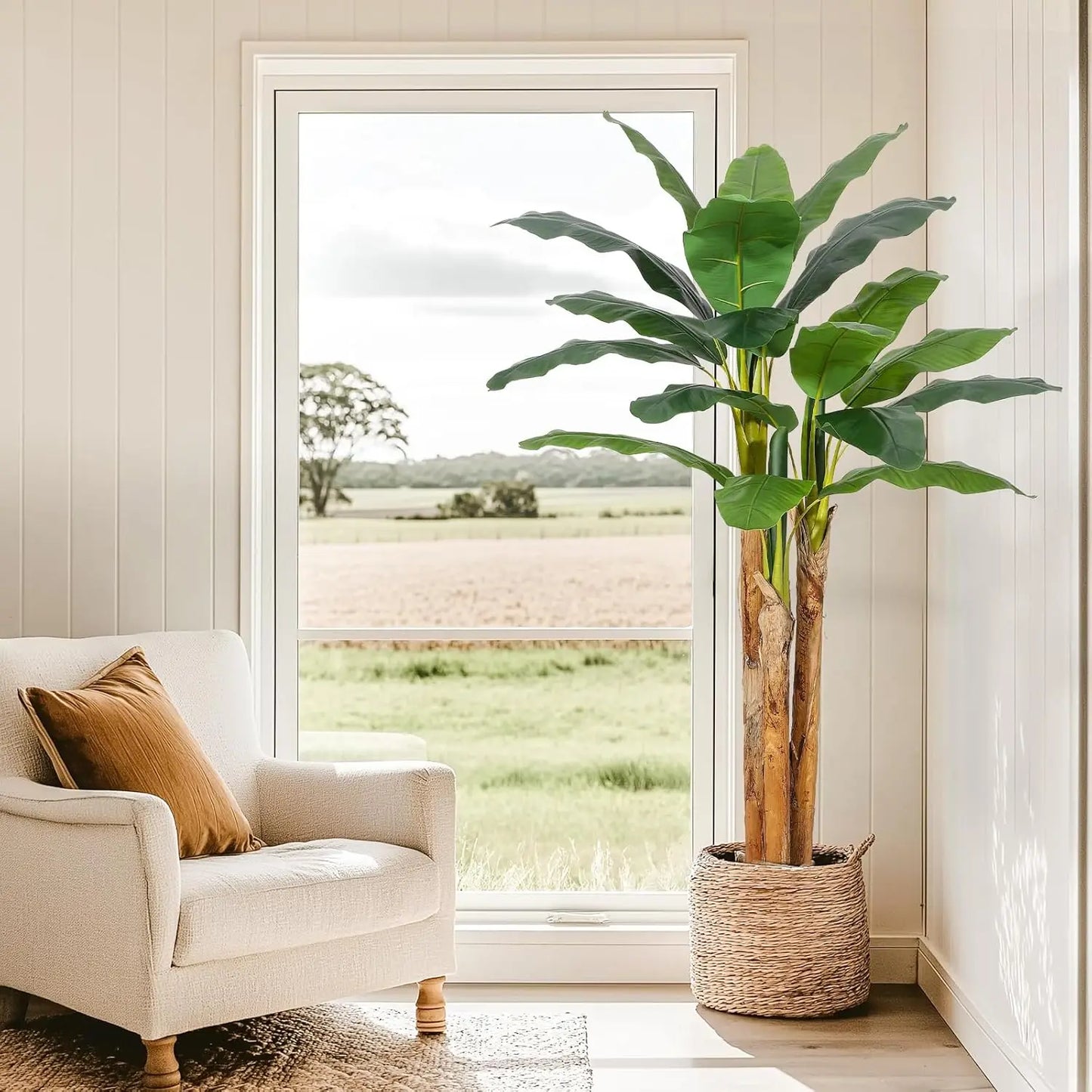 Bring tropical charm into any room with this lifelike artificial banana tree in a grey planter, designed to stay vibrant and easy to care for year after year.