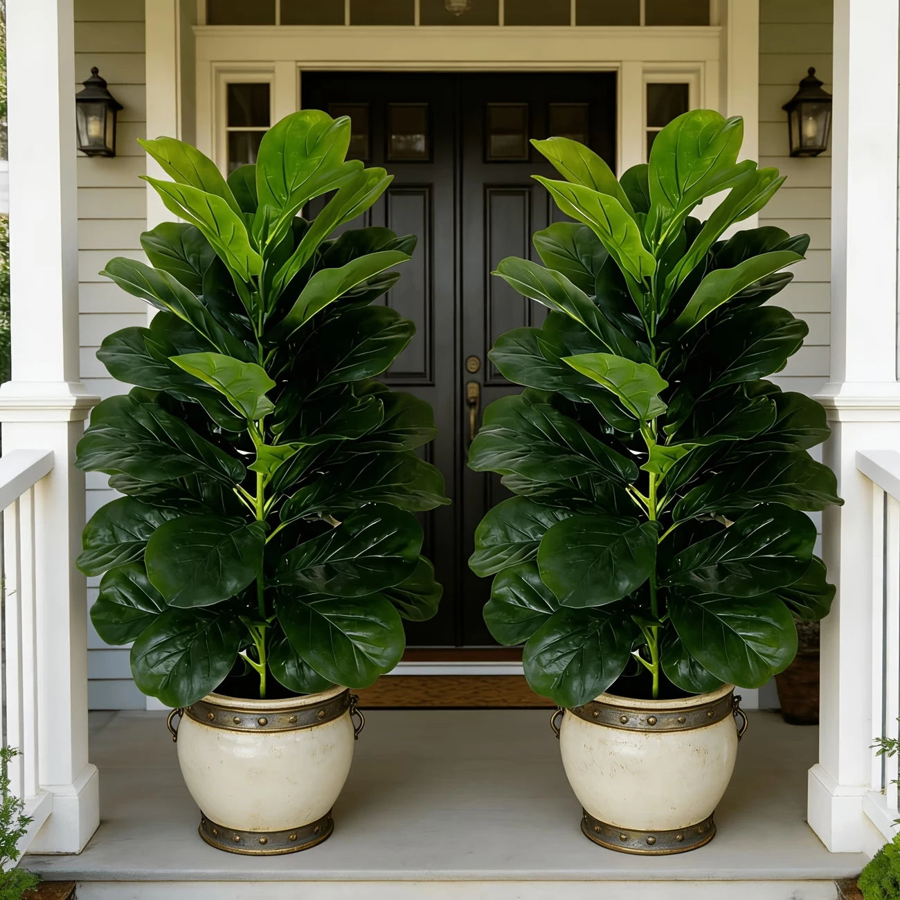 You can elevate any space with two 3-foot artificial fiddle leaf fig trees in white geometric pots.