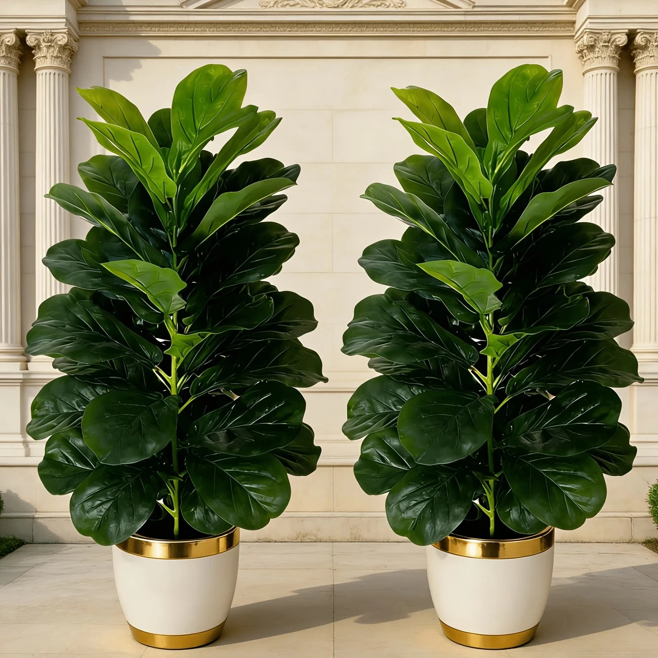 You can elevate any space with two 3-foot artificial fiddle leaf fig trees in white geometric pots.