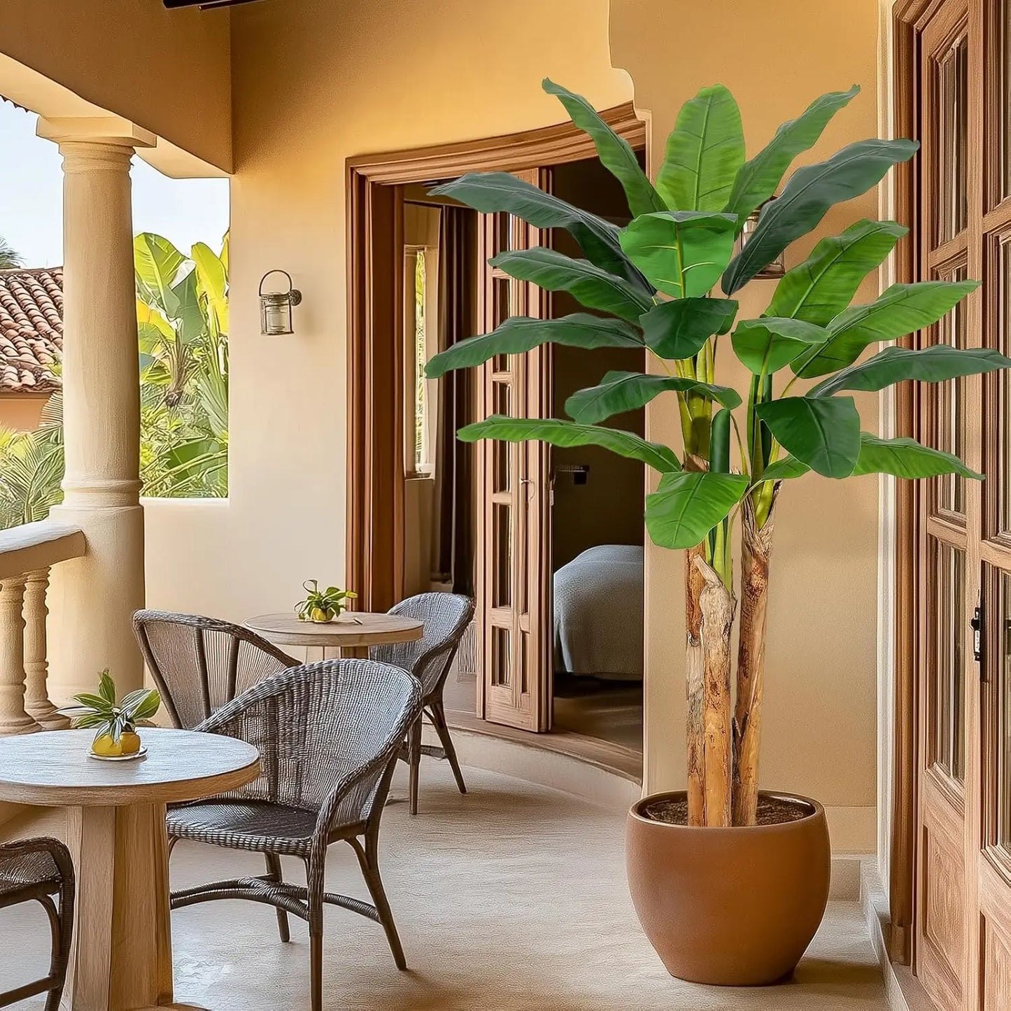 Bring tropical charm into any room with this lifelike artificial banana tree in a grey planter, designed to stay vibrant and easy to care for year after year.